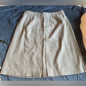 Rejoice 100% pure wool gray skirt. No size tag inside. measures 34 inch waist.